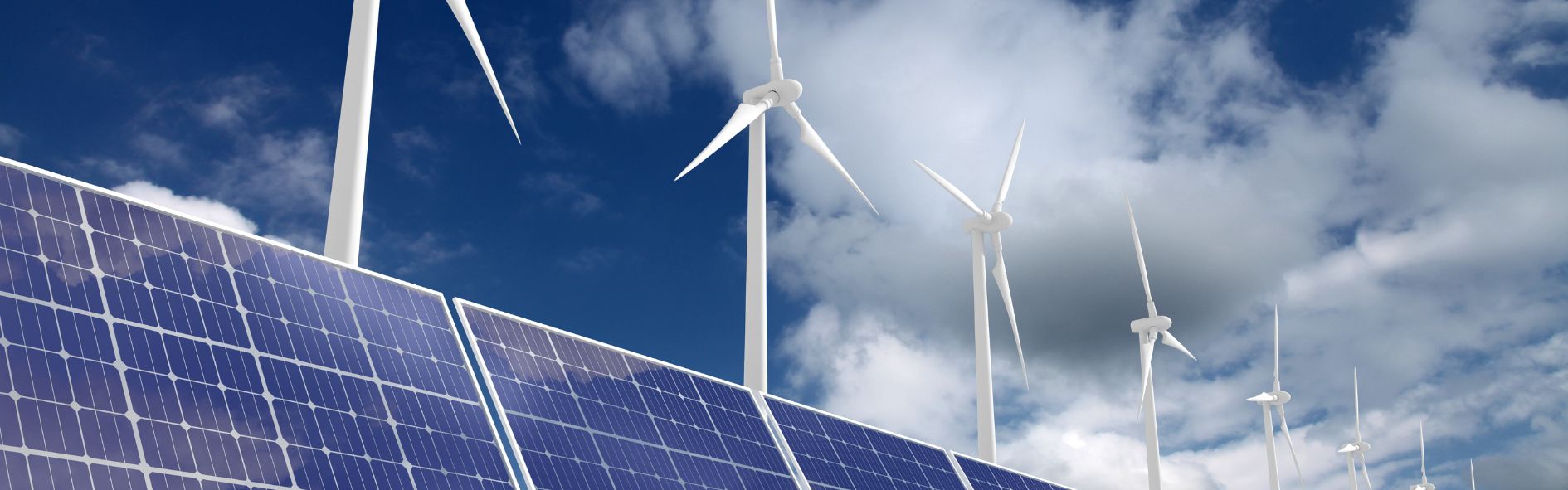 Paneles solares y aerogeneradores que muestran las ventajas de las energías renovables.